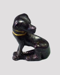 Figurine of a dog made of bronze with a gold collar 