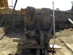 Double statue of Amenhotep III and the sun god, Re-Horakhti. The statue was uncovered at the site of Amenhotep III's mortuary temple complex on the west bank of Luxor (Photo: SCA)